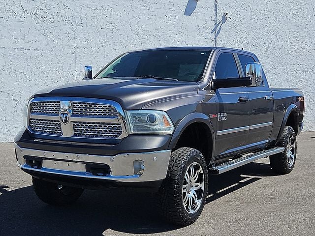 2014 RAM 1500 Laramie in Granite Crystal Metallic Clearcoat — front three-quarter view
